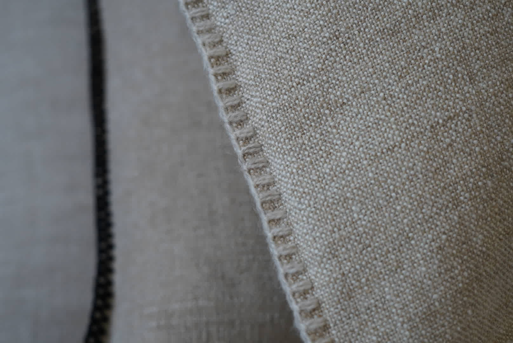 Anton-Sand-ivory-stitching-50x50-incl.-filling_Indoor-Cushions_2204_1.webp